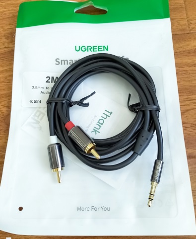 Cáp Audio 3.5mm ra 2 đầu hoa sen (RCA) dài 2m Ugreen 10584